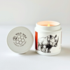 Hand-poured coconut wax candle scented with oakmoss featuring a rhino design